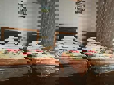 Phuntsok Rabse Hotel - slaapkamer