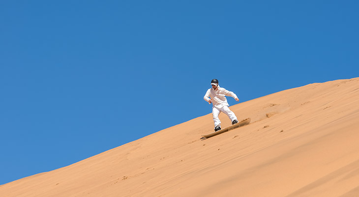 Sandboarden in Namibie